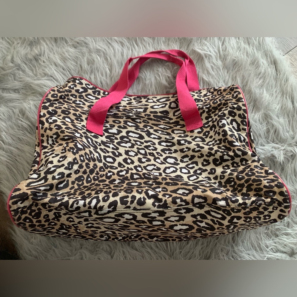 Pink and leopard print carrying bag large overnight case.